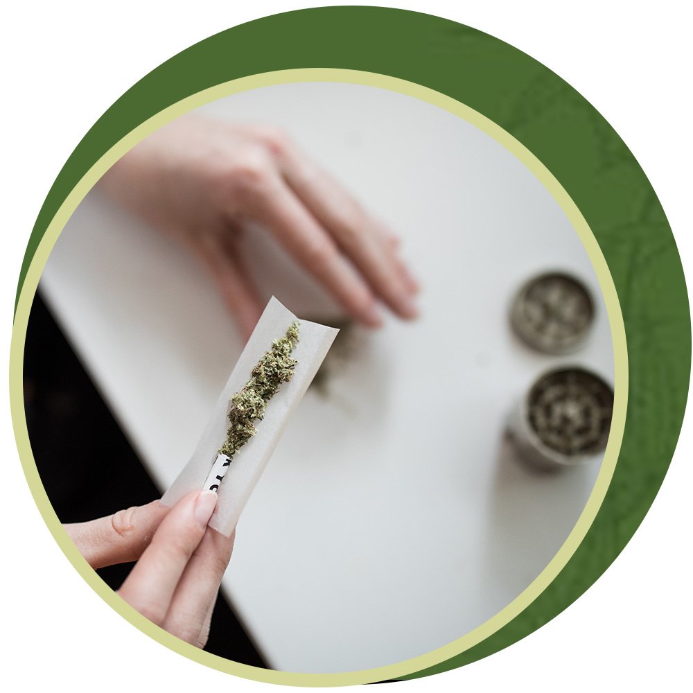 Person rolling joint